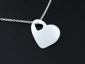 Srebrna zawieszka serce z wyciętym małym serduszkiem