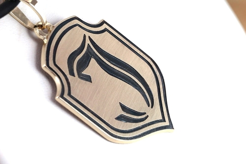 Złota ciężka zawieszka herb