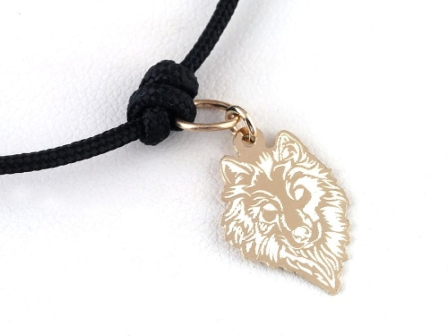 Sznureczkowa bransoletka ze złotą głową wilka