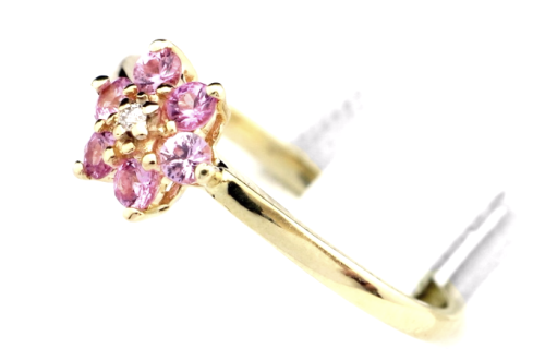Pierścionek z diamentem i z różowymi topazami