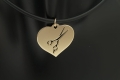 Złote serduszko z nożyczkami