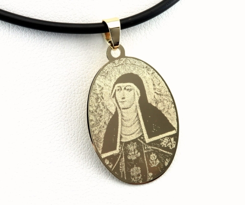 Złoty  owalny medalik z podobizną Św. Kingi