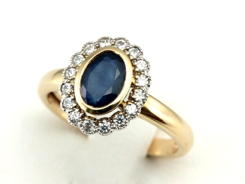 Złoty pierścionek z szafirem naturalnym i cyrkoniami