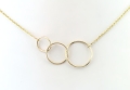 Złoty naszyjnik trzy przeplecione koła