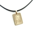 złota prostokątna zawieszka z wizerunkiem Jezusa