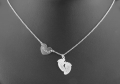 Srebrny naszyjnik serce i stopki