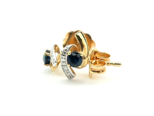 Kolczyki z diamentami i szafirami