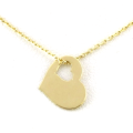 Złota zawieszka serce z wyciętym małym serduszkiem