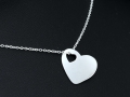 Srebrna zawieszka serce z wyciętym małym serduszkiem