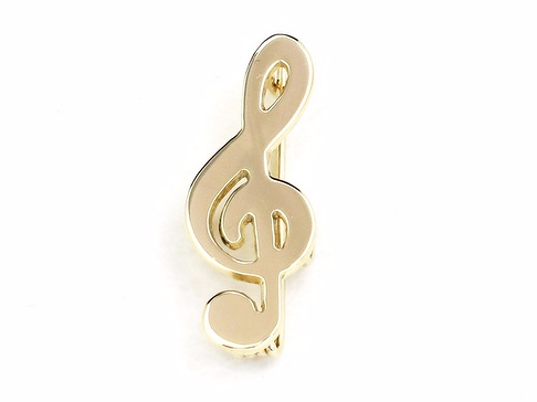 Złota broszka klucz wiolinowy