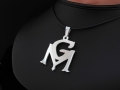 Srebrna zawieszka - symbol GM