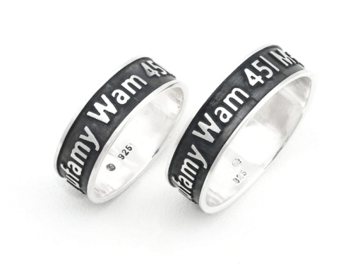 Srebrna obrączka z napisem wypukłym