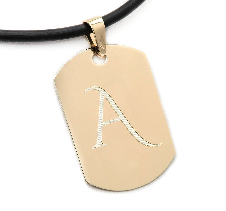 Złoty nieśmiertelnik z inicjałe i znakiem zodiaku