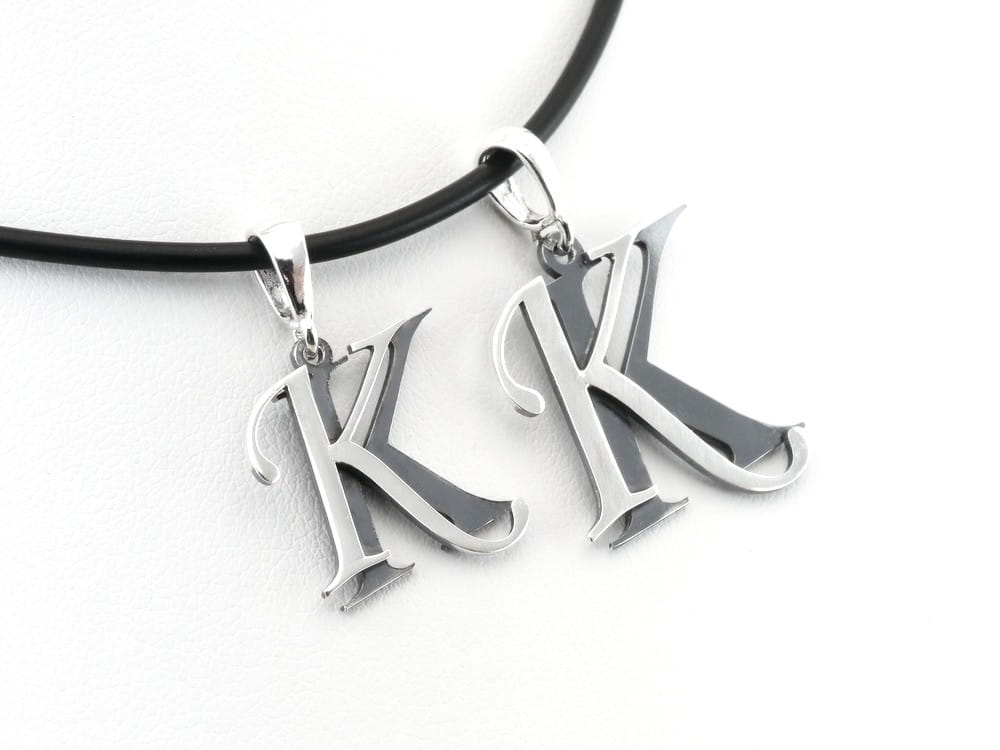 Srebrny komplet inicjałów - dla niej i dla niego