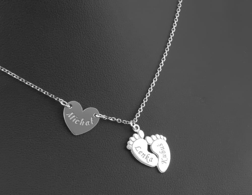 Srebrny naszyjnik serce i stopki