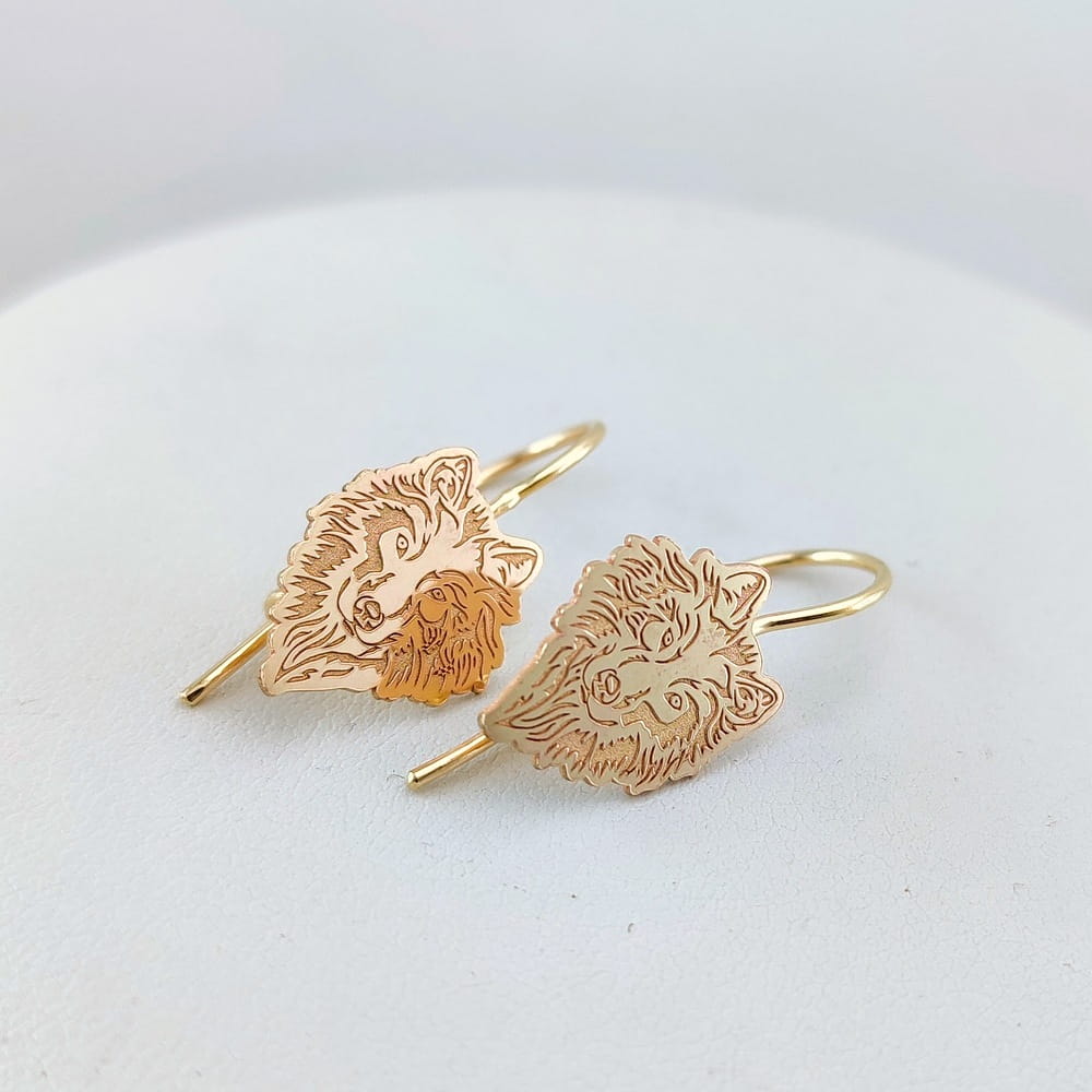 złote kolczyki wilki