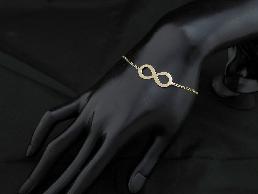 Złota bransoletka ze znakiem nieskończoności